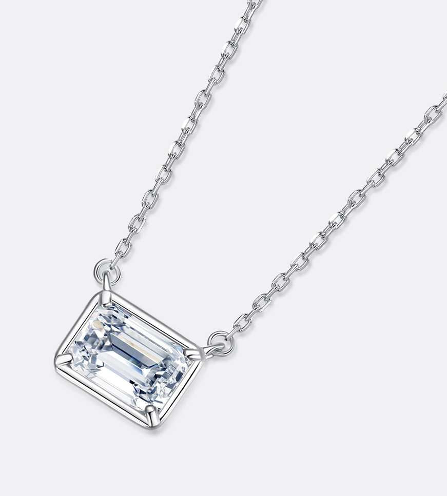 1 Carat Emerald Cut East-West Bezel Moissanite Pendant Necklace in 18K White Gold over Silver