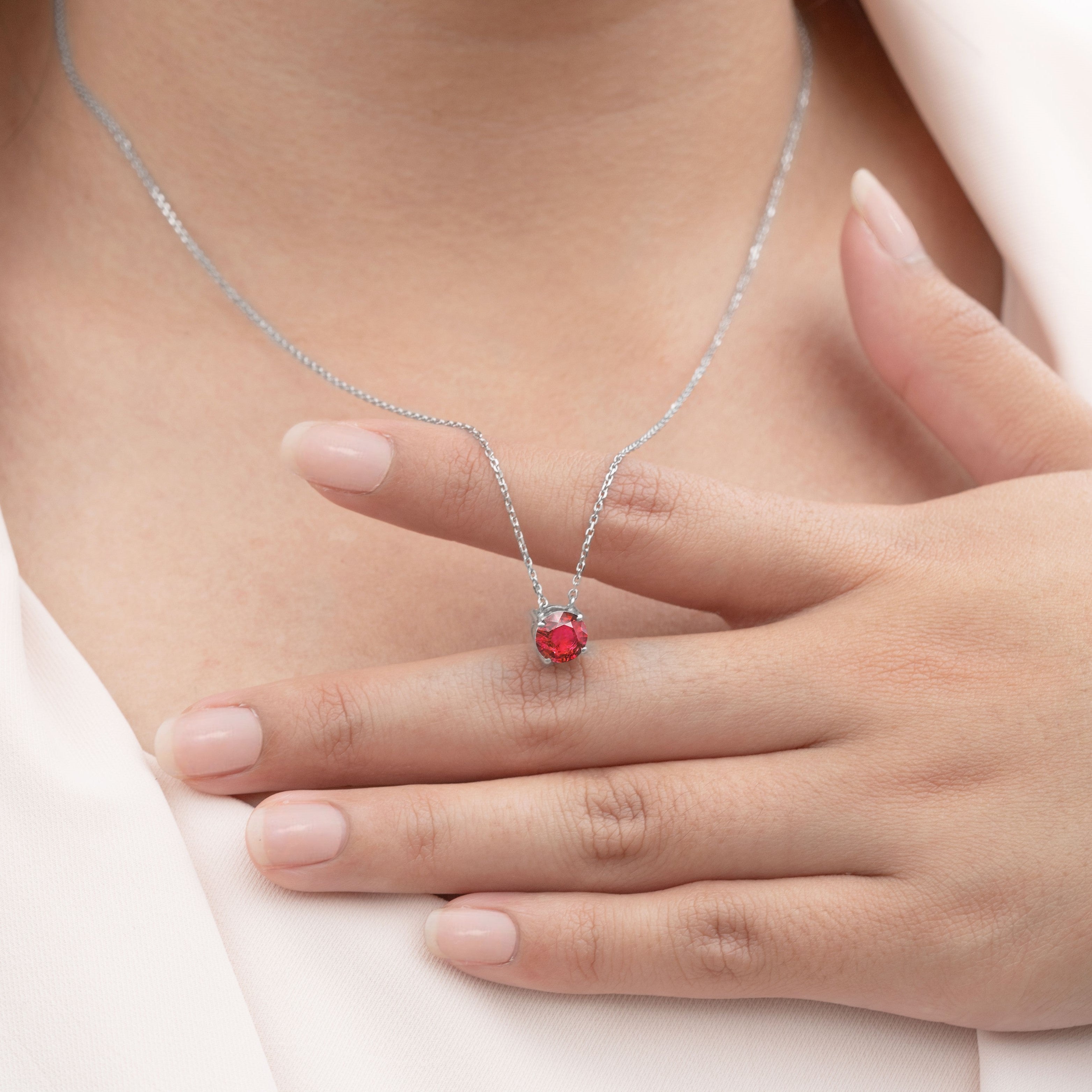 1 Carat Round Cut Lab-Created Ruby Solitaire Pendant Necklace in 18k White Gold Over Silver