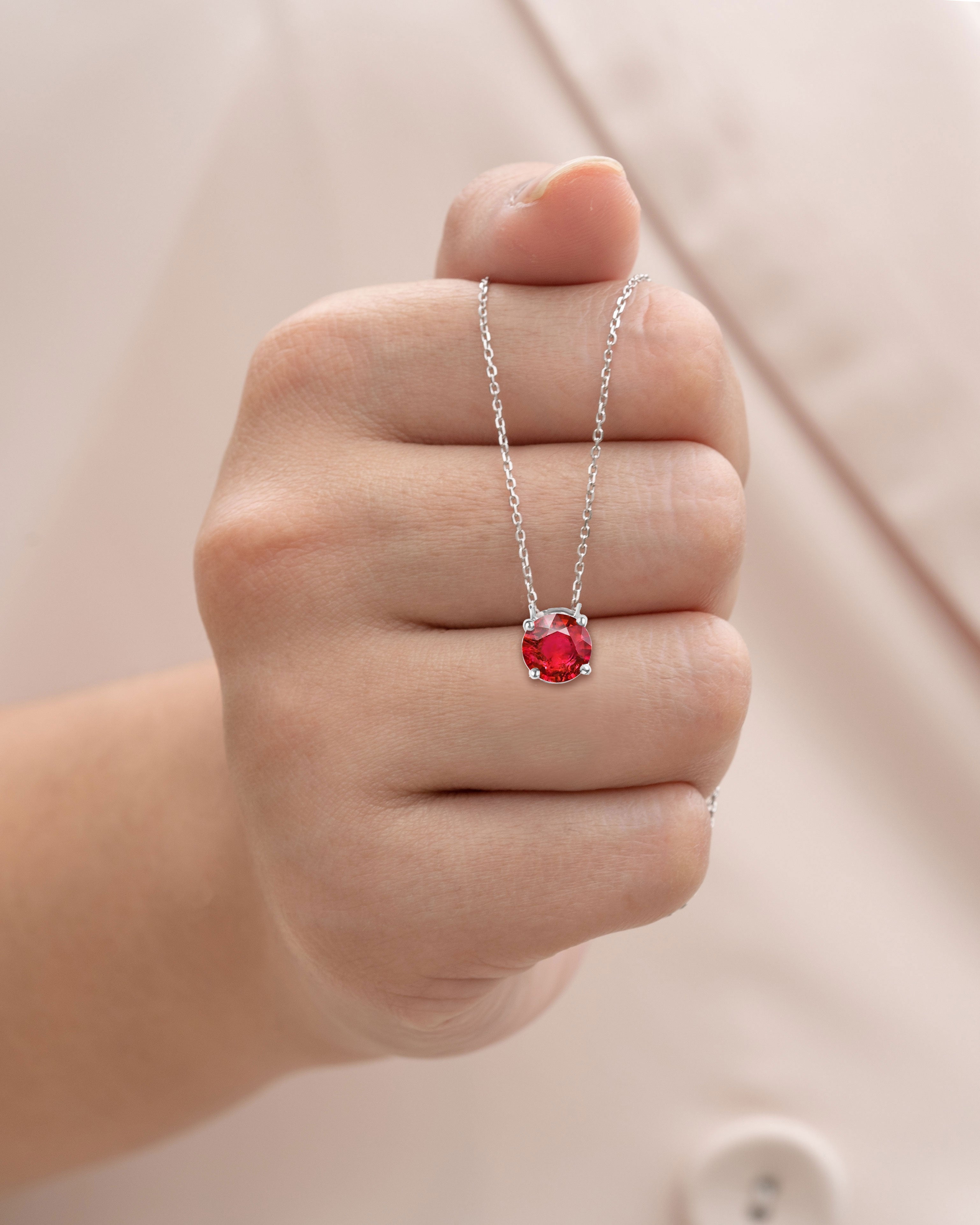 1 Carat Round Cut Lab-Created Ruby Solitaire Pendant Necklace in 18k White Gold Over Silver