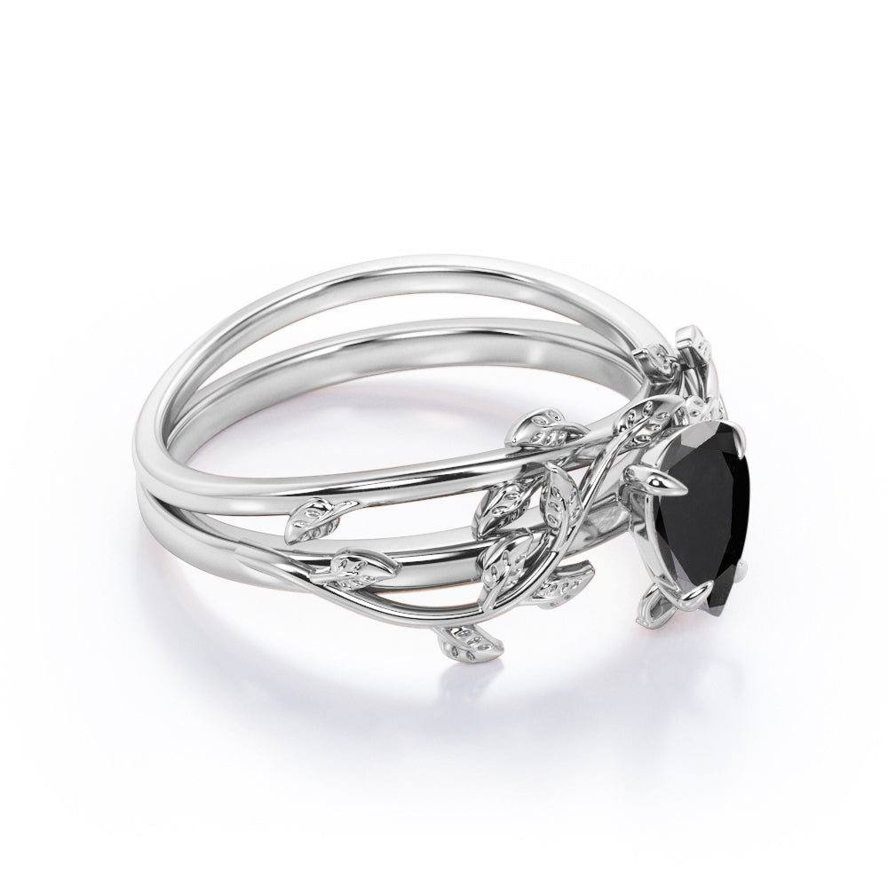 1 carat pear cut Black diamond butterfly style bridal set in white gold