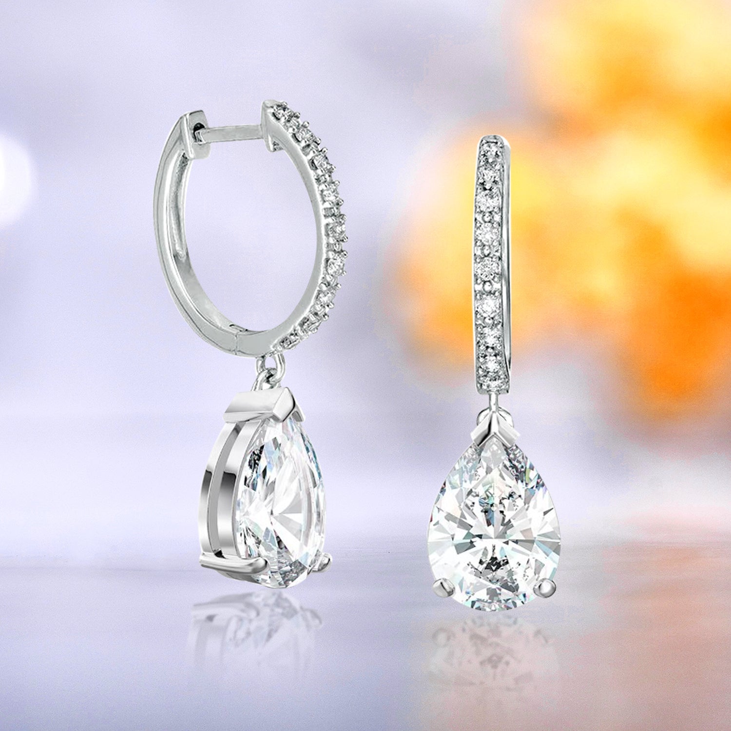 1.5 Carat Pear Cut Moissanite Hoop Earrings Pave Set with Charm in 18K White Gold over Silver