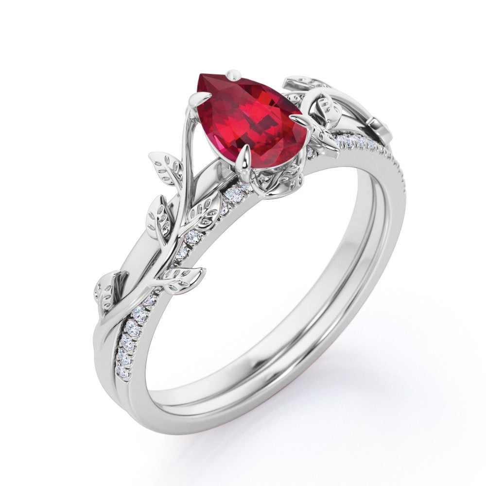 Art Deco Inspired 1.25 carat Pear Cut Lab-Created Ruby and Diamond Pave Bridal ring set in White Gold