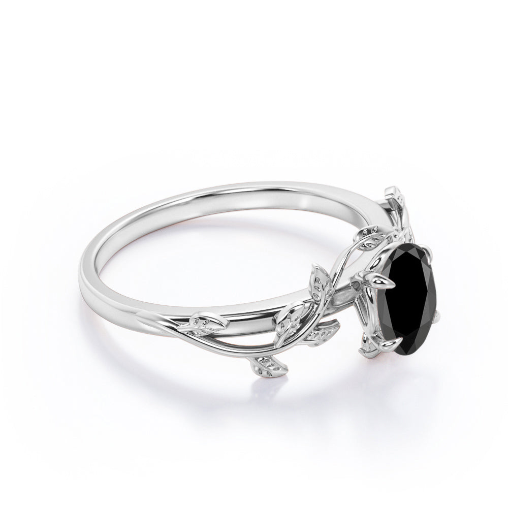 1 carat oval cut Black diamond leaf style engagement ring in white gold