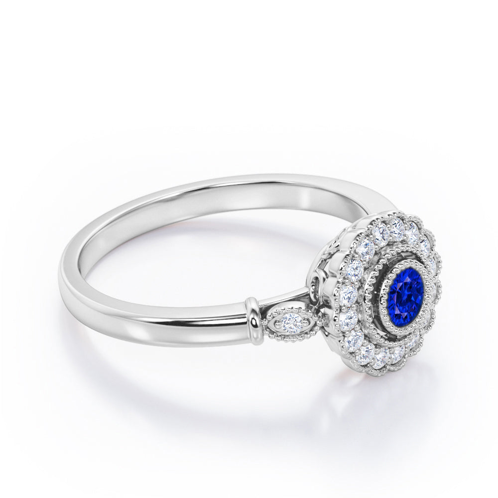 Milgrain Flower Halo 1.2 carat Carat Round Brilliant Cut Blue Sapphire and diamond Trilogy Bezel Engagement Ring in White Gold