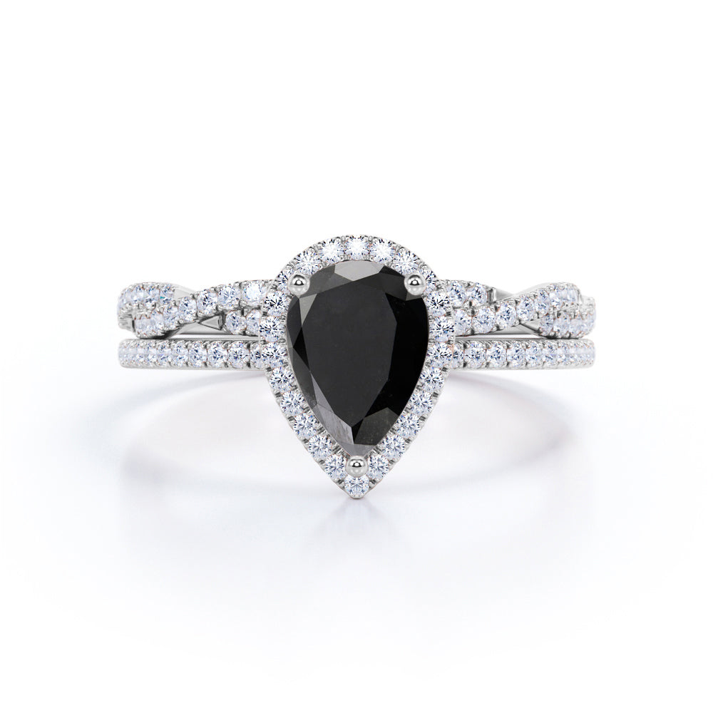 1.50 carat pear cut Black Diamond twisted wedding ring set in white gold