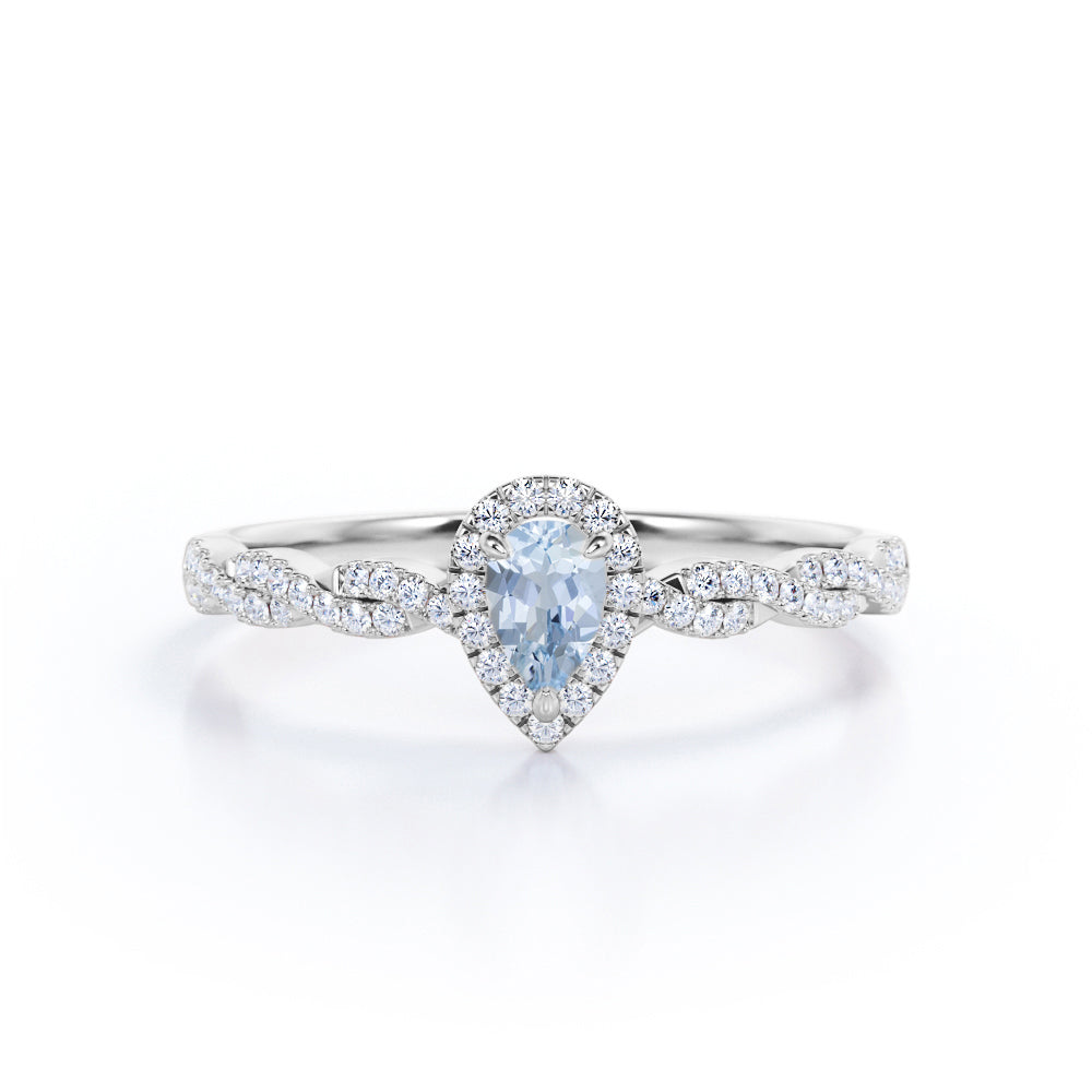 1.20 Carat Pear Cut Aquamarine And Diamond Halo Engagement Ring In White Gold