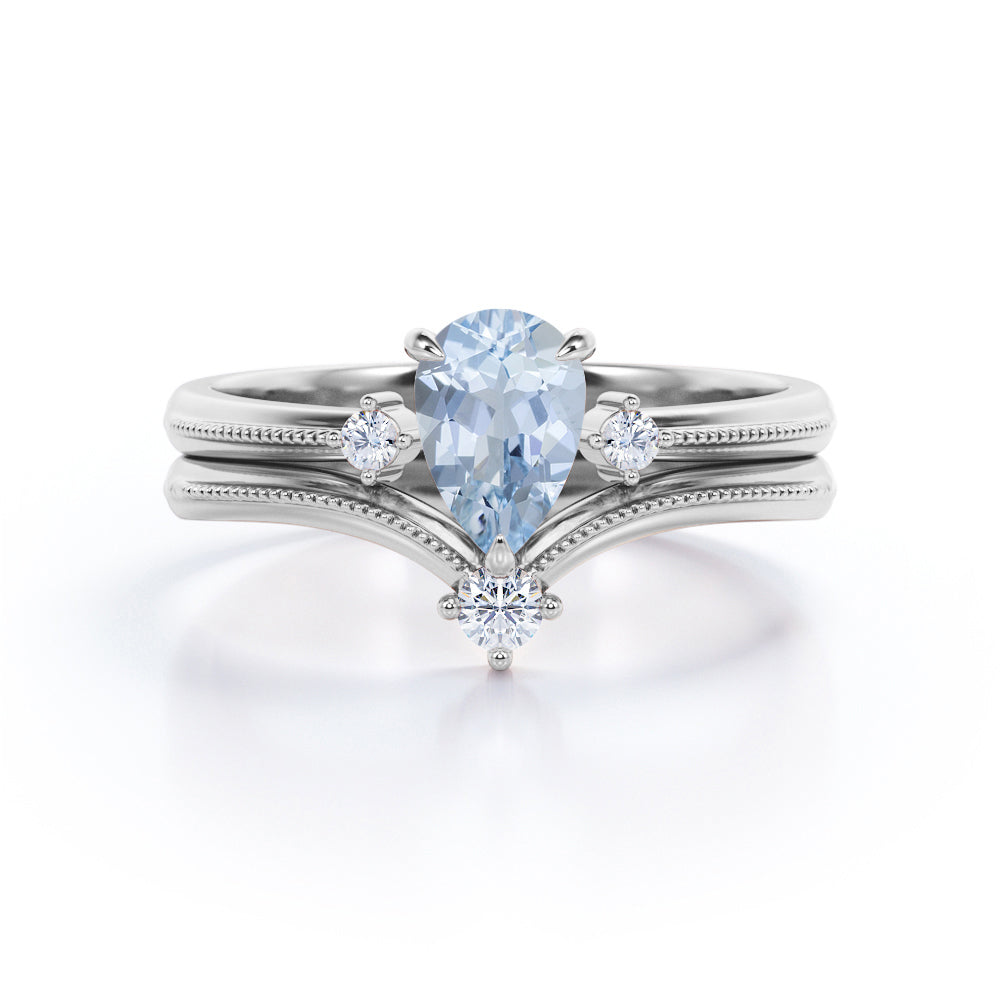 1.15 Carat Pear Cut Aquamarine And Diamond V-Shaped Wedding Ring Set In White Gold