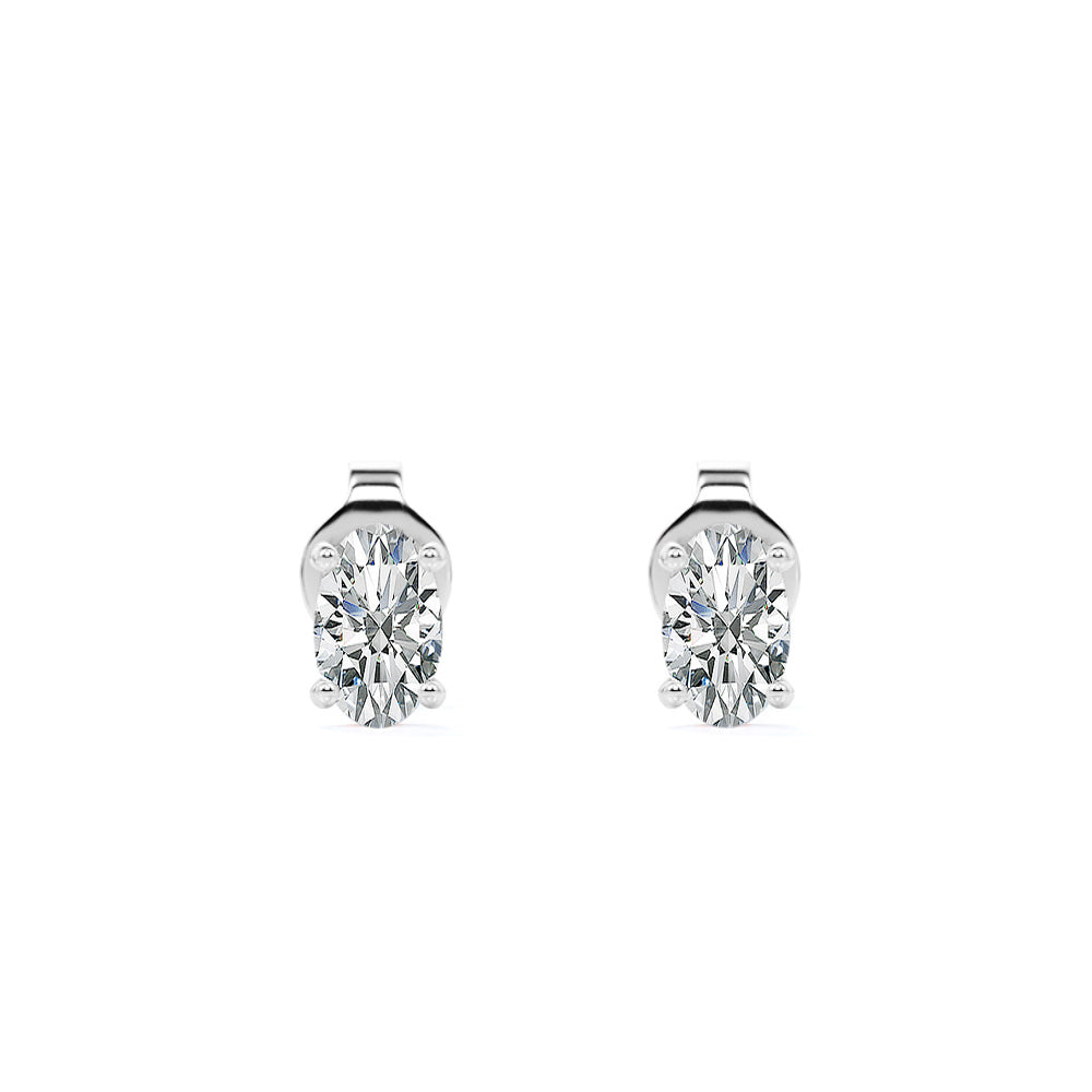 0.33 Carat Ovate Diamond - 4 Prong Solitaire Stud Earrings - 18K White Gold Plating Over Silver