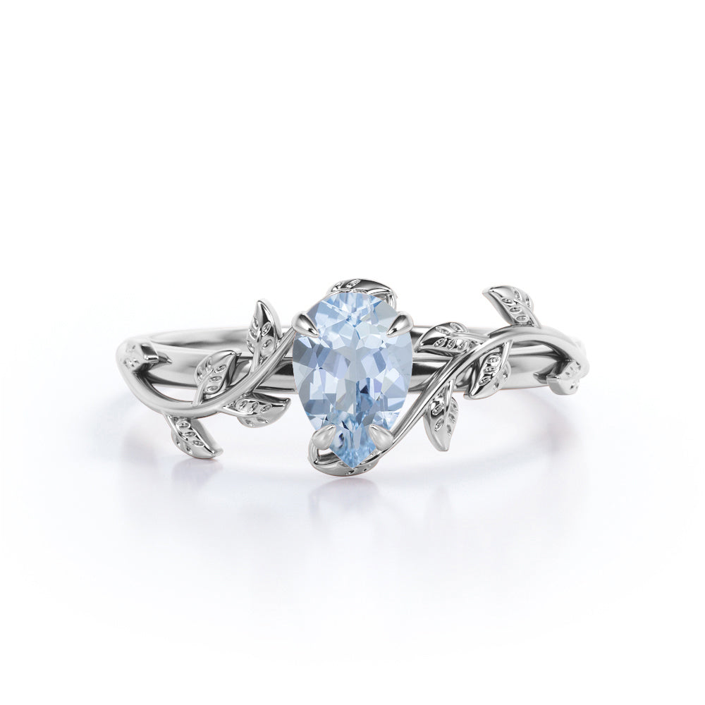 1 Carat Pear Cut Aquamarine Flower Inspired Engagement Ring In White Gold