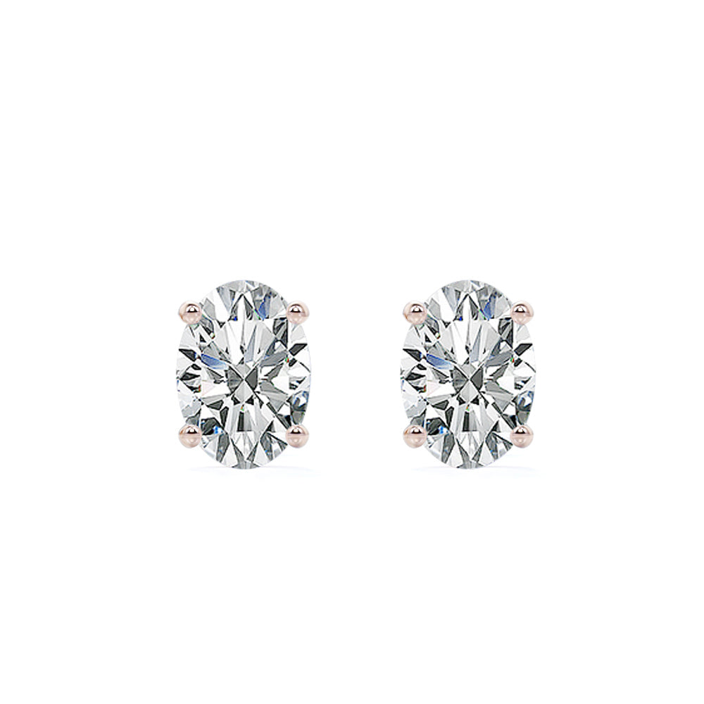 2 Carat Oval Cut Moissanite Solitaire Stud Earrings - 4 Prong - In 18K Rose Gold Plating Over Silver.