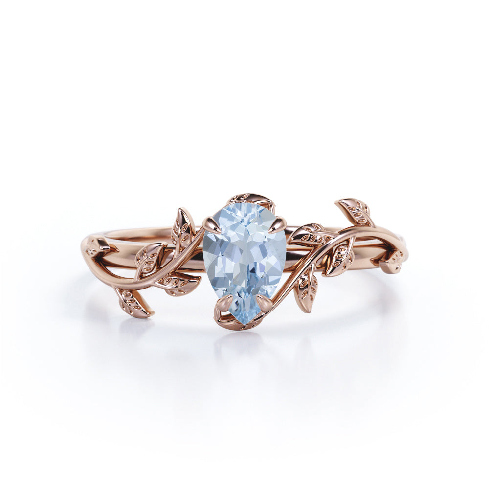 1 Carat Pear Cut Aquamarine Flower Inspired Engagement Ring In White Gold