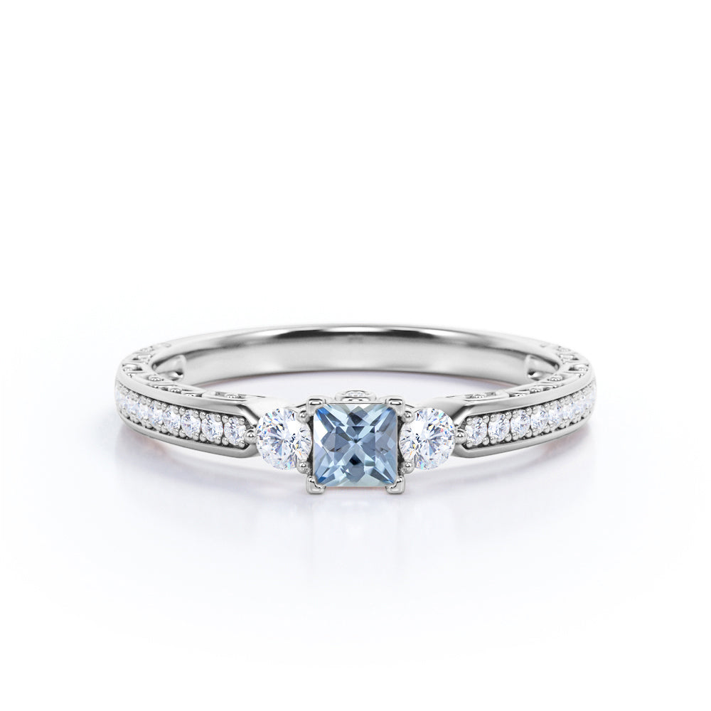 1.10 Carat Princess Cut Aquamarine And Diamond Channel Set Engagement Ring In White Gold