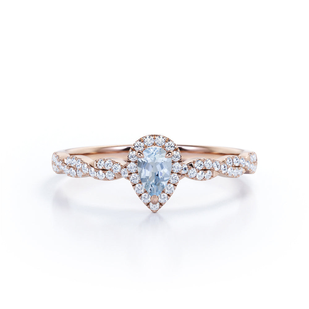 1.20 Carat Pear Cut Aquamarine And Diamond Halo Engagement Ring In White Gold