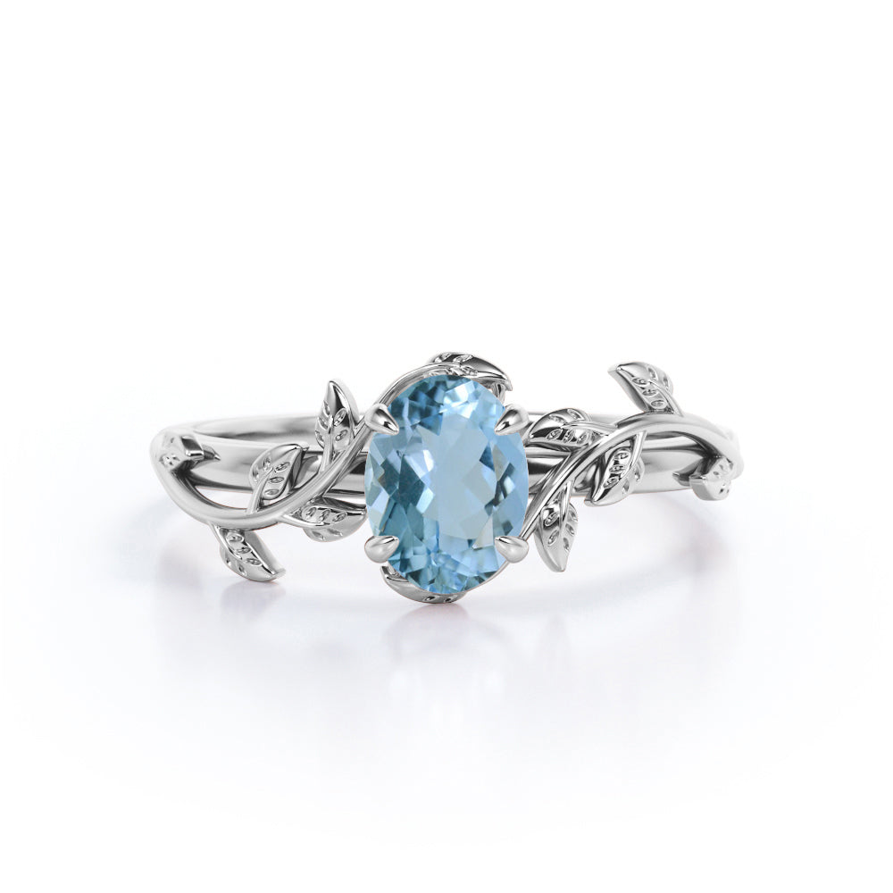 1 Carat Oval Cut Aquamarine Leaf And Vine Engagement Ring In White Gold