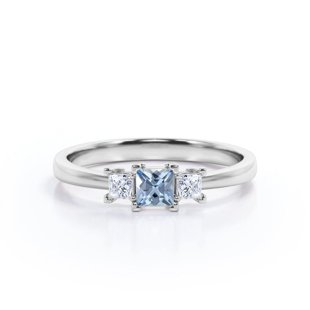 1 Carat Princess Cut Aquamarine And Diamond Three Stone Engagement Ring In White Gold