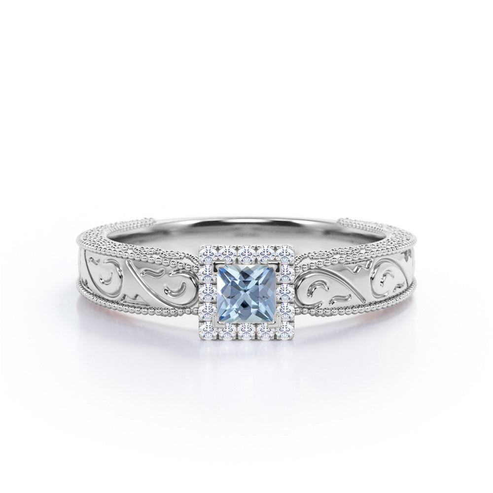 1.10 Carat Princess Cut Aquamarine And Diamond Halo Engagement Ring In White Gold