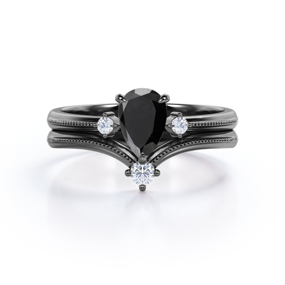 1 carat tear drop cut Black Diamond V shaped wedding ring set in white gold