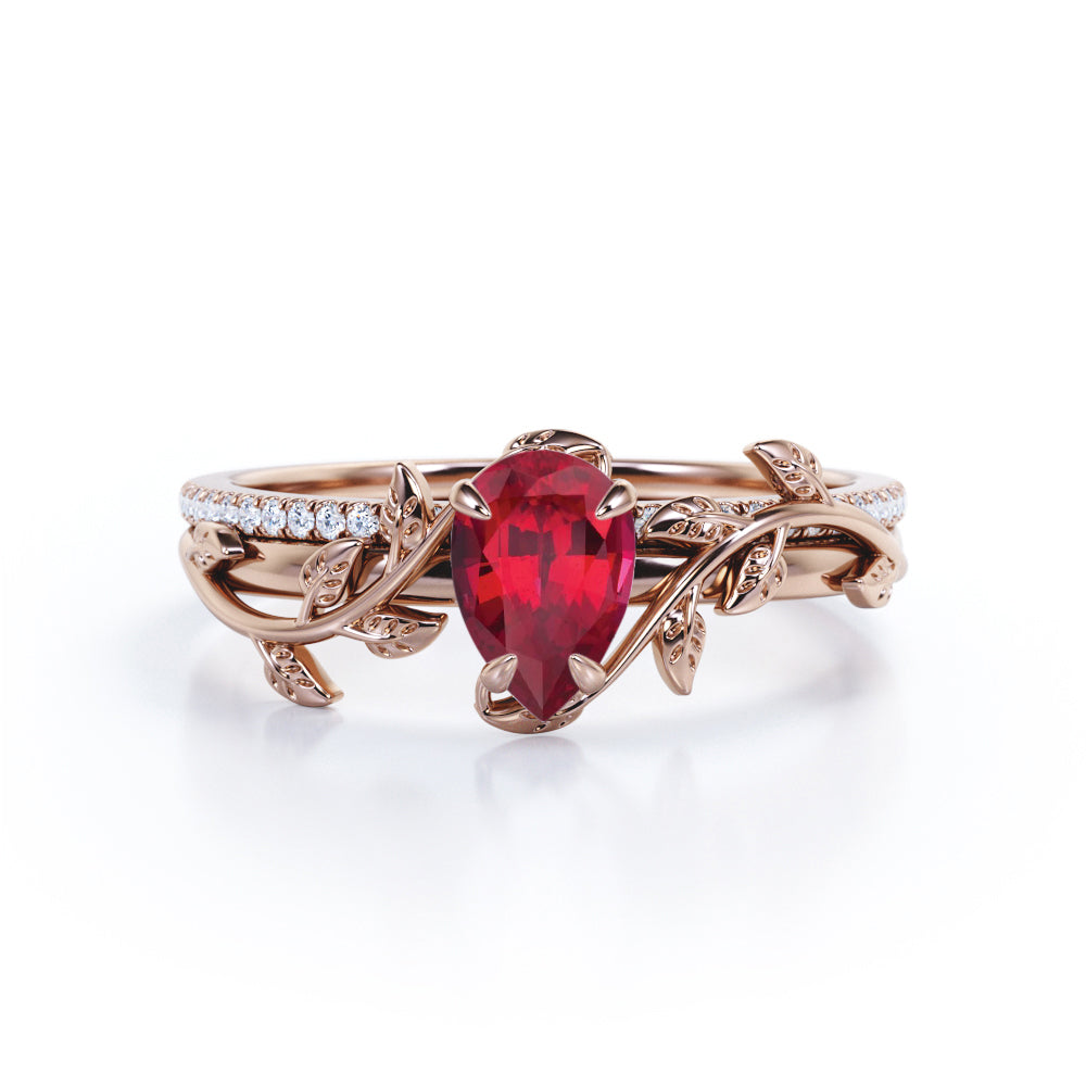 Art Deco Inspired 1.25 carat Pear Cut Lab-Created Ruby and Diamond Pave Bridal ring set in White Gold