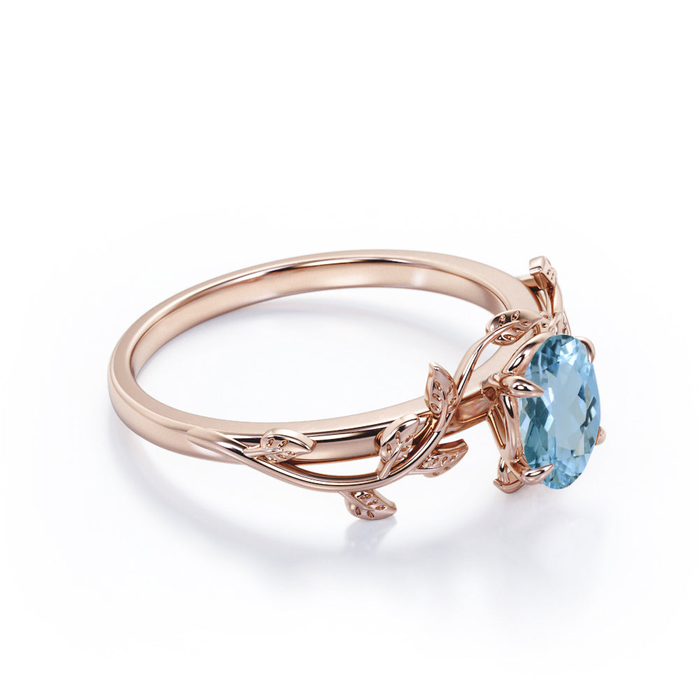 1 Carat Oval Cut Aquamarine Leaf And Vine Engagement Ring In White Gold