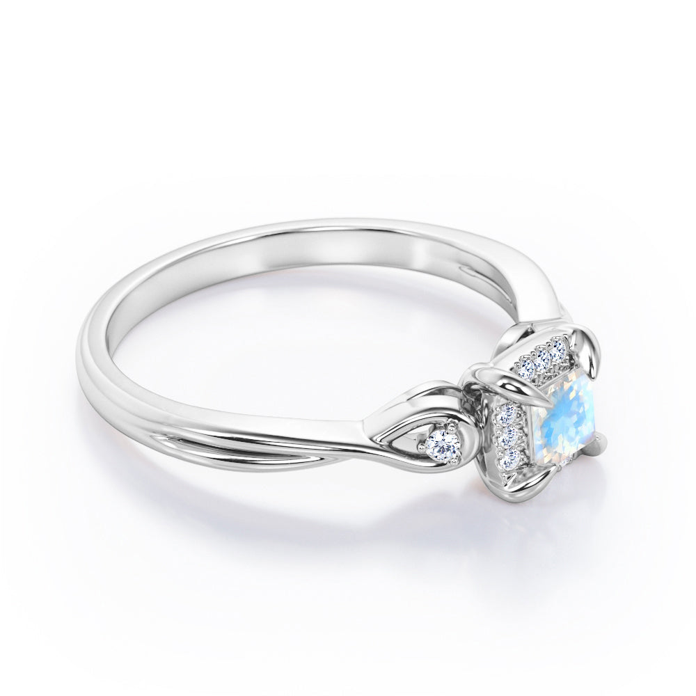 Prong and Halo 0.6 carat Princess Moonstone and Moissanite Twisted Shank Engagement Ring in White Gold