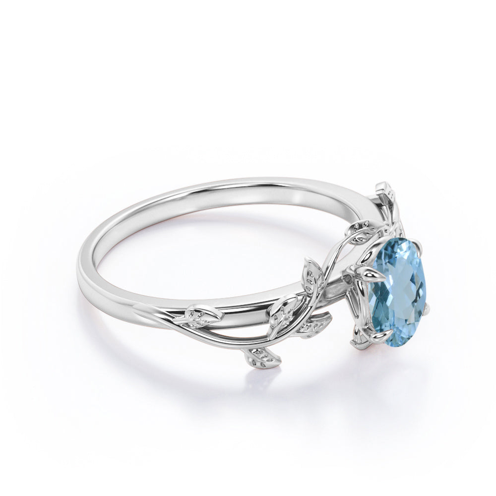 1 Carat Oval Cut Aquamarine Leaf And Vine Engagement Ring In White Gold