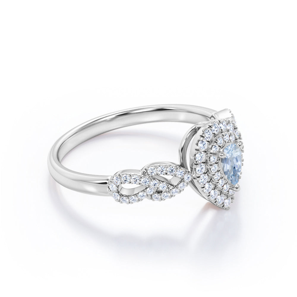 1.5 Carat Pear Cut Aquamarine And Diamond Double Halo Engagement Ring In White Gold