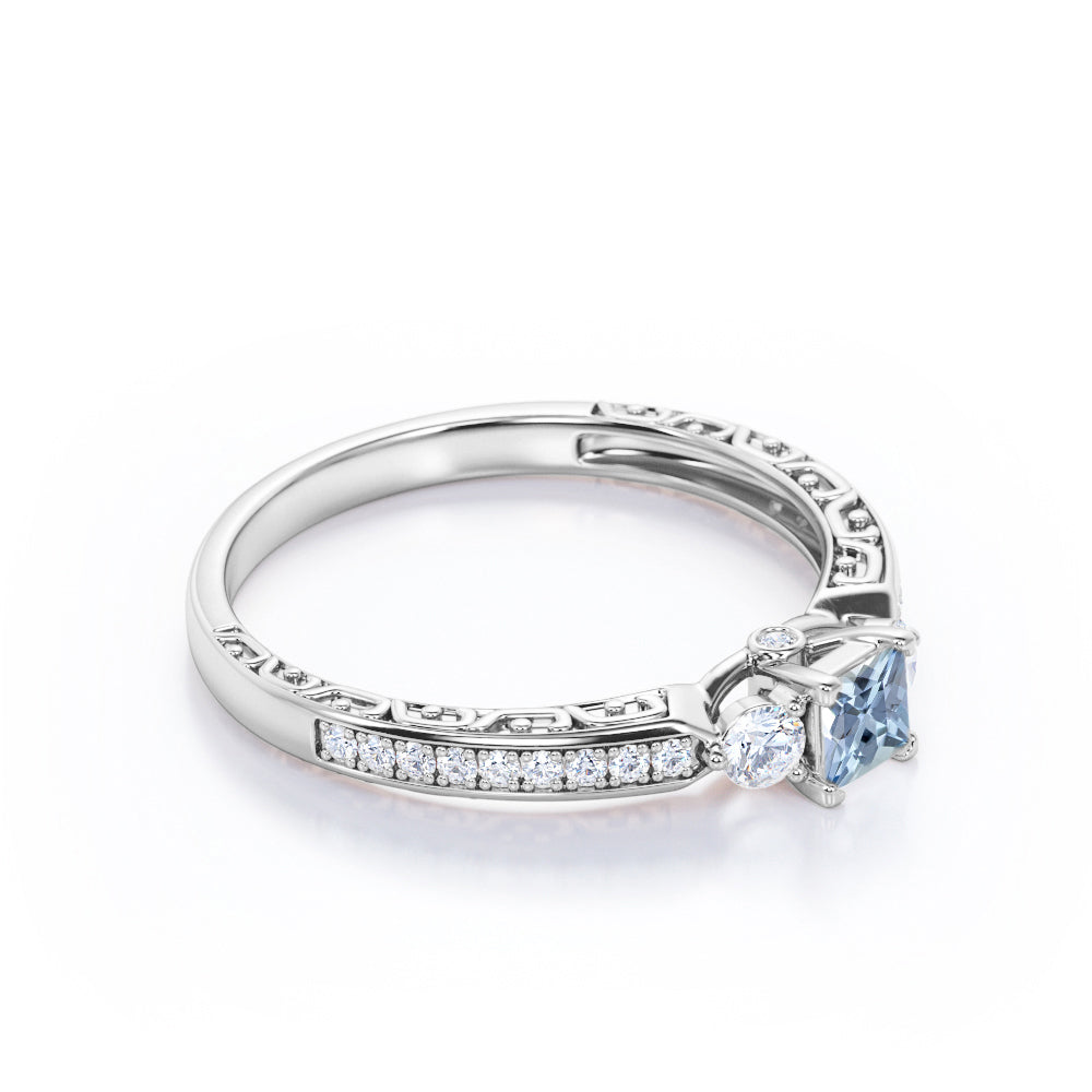 1.10 Carat Princess Cut Aquamarine And Diamond Channel Set Engagement Ring In White Gold