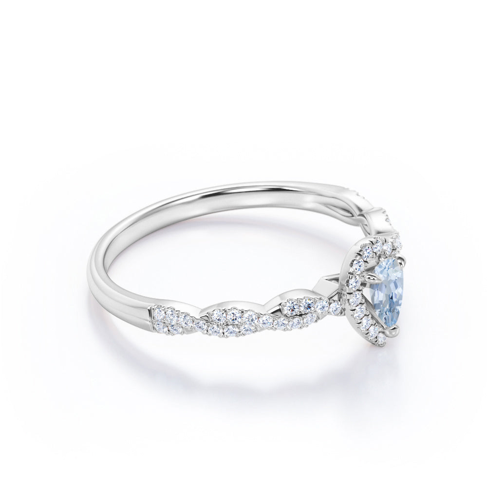 1.20 Carat Pear Cut Aquamarine And Diamond Halo Engagement Ring In White Gold