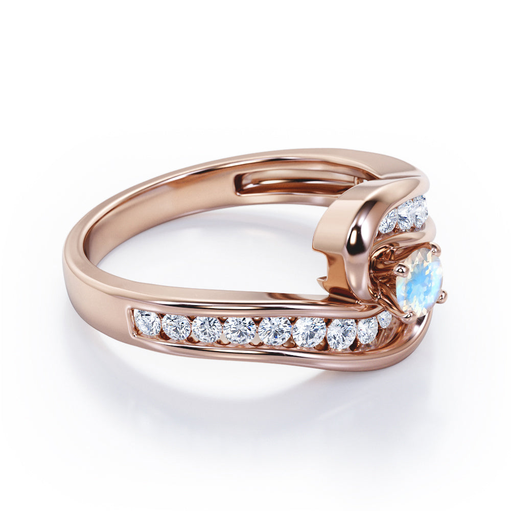 Spinning 0.7 carat Round Moonstone and Moissanite Channel Engagement Ring in Rose Gold