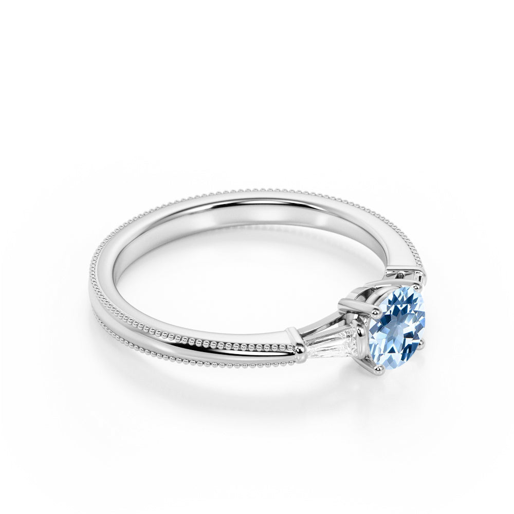 1.10 carat Round Sky Blue Created Aquamarine 3 Stone Simple Engagement Ring in 18k Yellow Gold over Silver