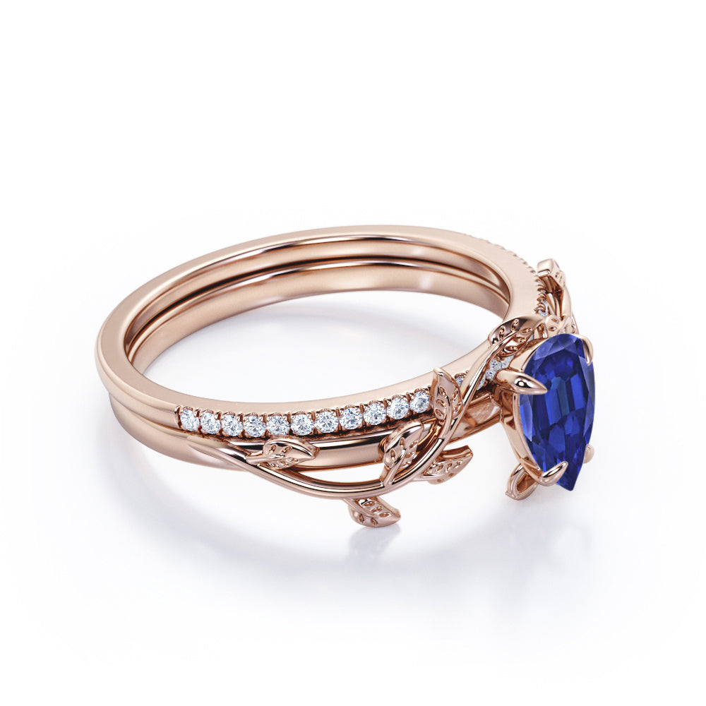 Pave style 1.25 carat Pear Cut Lab-Created Sapphire and Diamond floral wedding ring set in White Gold