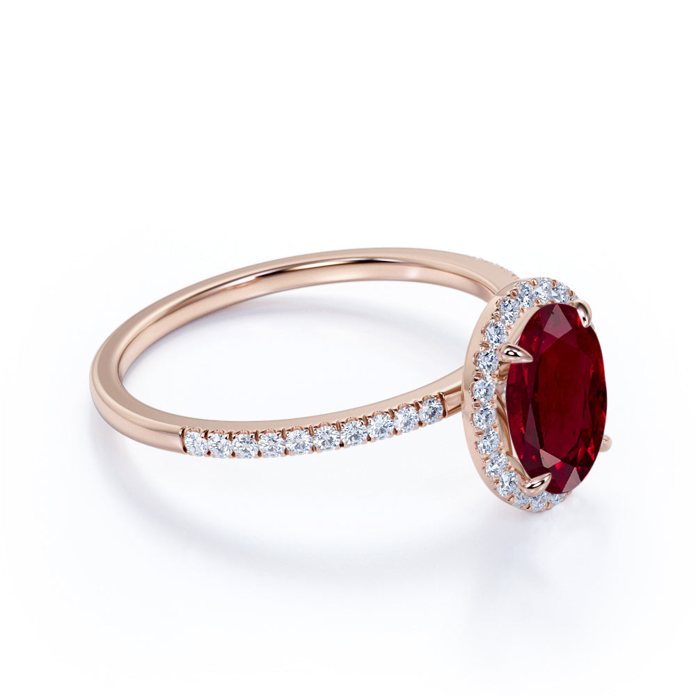 Antique 1.25 Carat Oval Cut Lab-Created Ruby and Diamond Halo Engagement Ring in Rose Gold