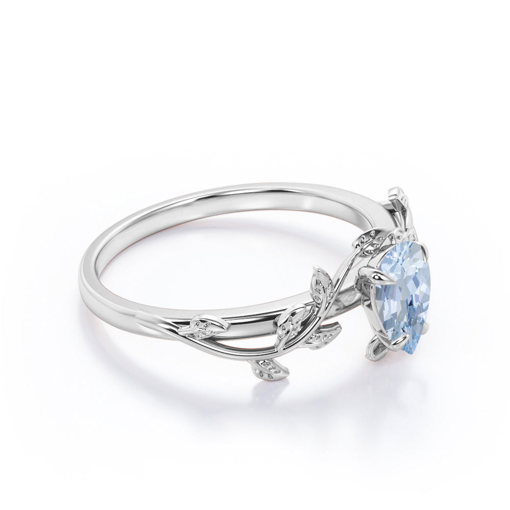 1 Carat Pear Cut Aquamarine Flower Inspired Engagement Ring In White Gold