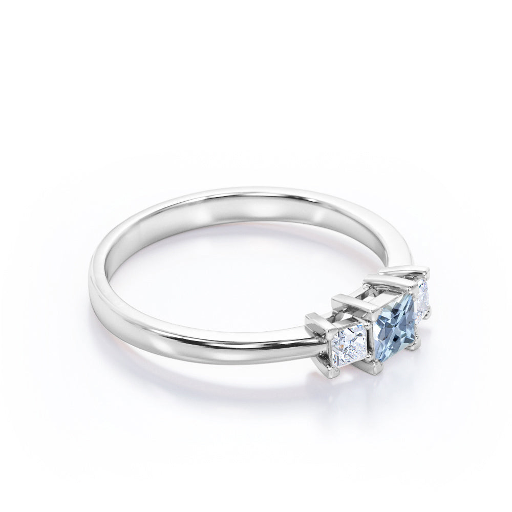 1 Carat Princess Cut Aquamarine And Diamond Three Stone Engagement Ring In White Gold