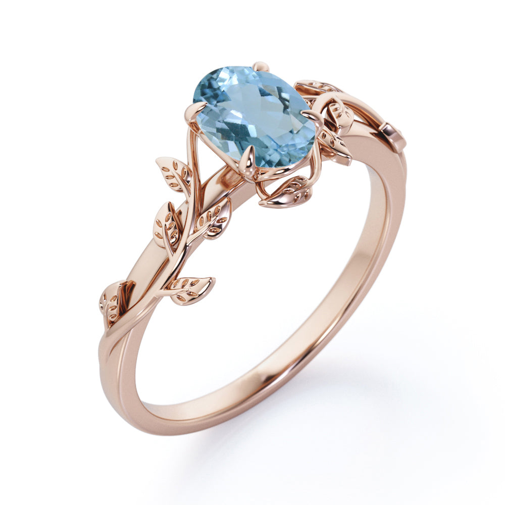 1 Carat Oval Cut Aquamarine Leaf And Vine Engagement Ring In White Gold