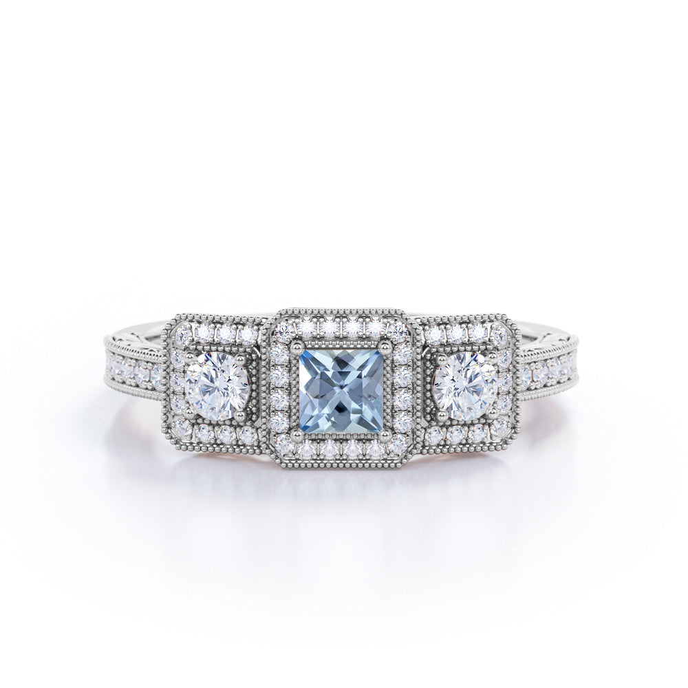 1.5 Carat Princess Cut Aquamarine And Diamond Halo Engagement Ring In White Gold