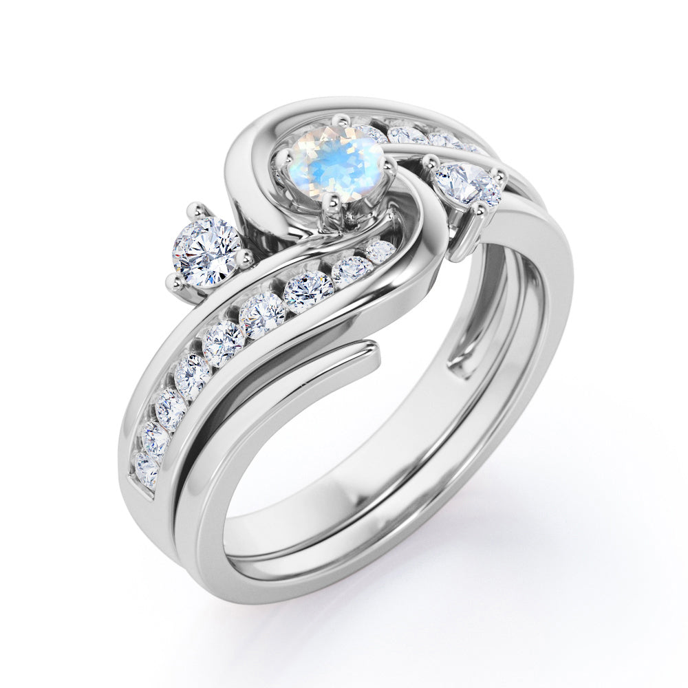 Twisted Tension - Prong 1 TCW Round Brilliant Cut Moonstone and Moissanite - Flush Channel Wedding Set in White Gold