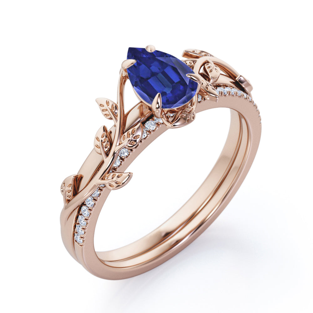 Pave style 1.25 carat Pear Cut Lab-Created Sapphire and Diamond floral wedding ring set in White Gold