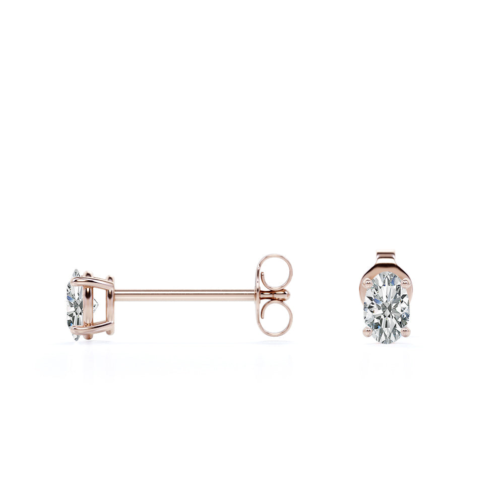 4 Prong 0.75 Carat Oval Cut Diamond Solitaire Stud Earrings In 18K Rose Gold Plating Over Silver