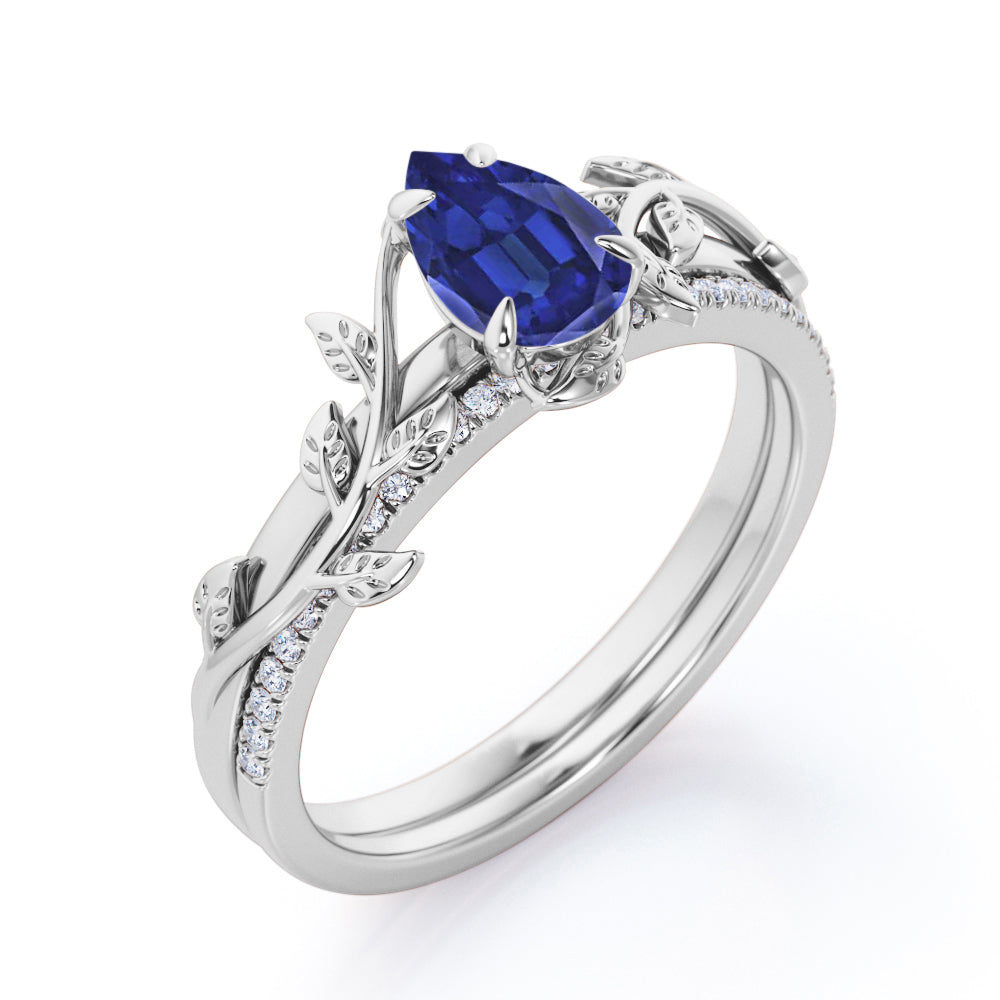 Pave style 1.25 carat Pear Cut Lab-Created Sapphire and Diamond floral wedding ring set in White Gold