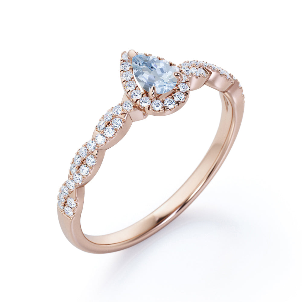 1.20 Carat Pear Cut Aquamarine And Diamond Halo Engagement Ring In White Gold