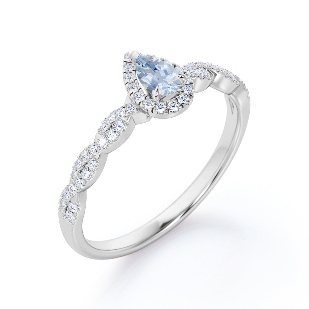 1.20 Carat Pear Cut Aquamarine And Diamond Halo Engagement Ring In White Gold