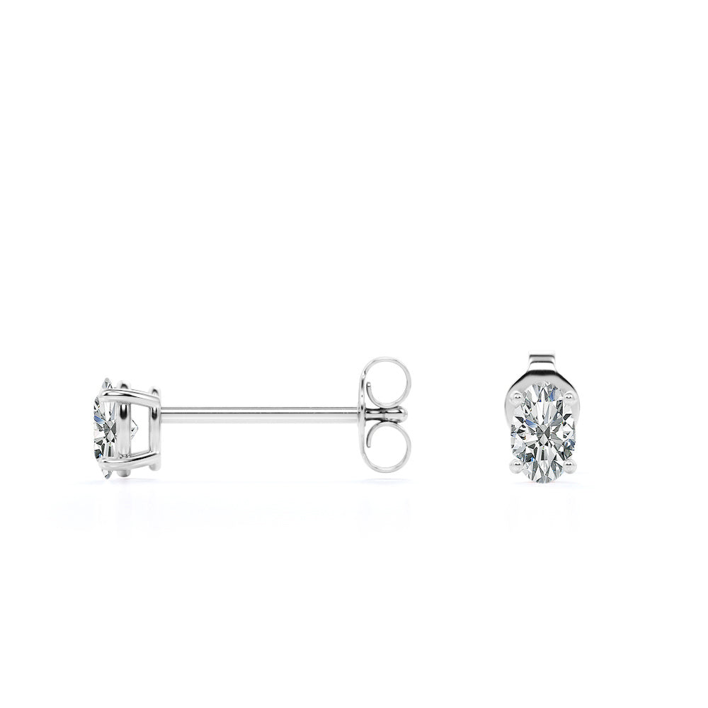 0.25 Carat Ovate Diamond - 4 Prong Solitaire Stud Earrings - 18K White Gold Plating Over Silver