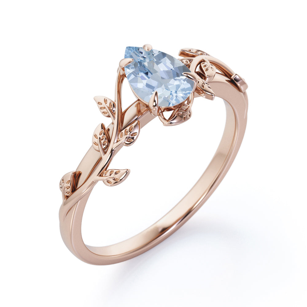 1 Carat Pear Cut Aquamarine Flower Inspired Engagement Ring In White Gold