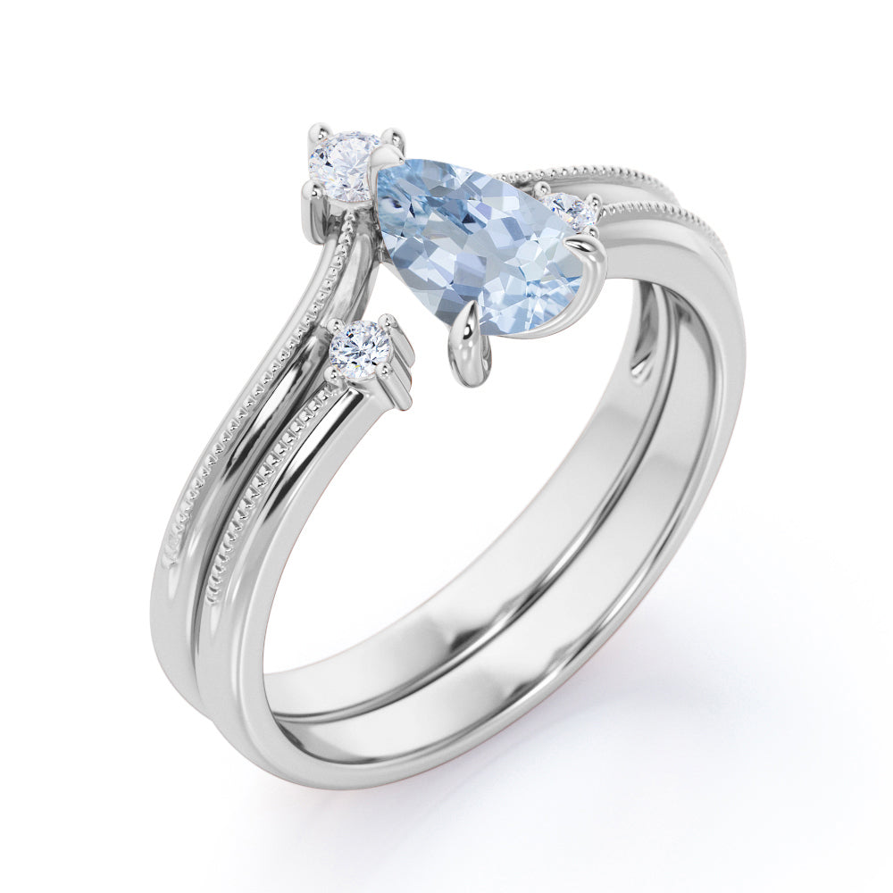 1.15 Carat Pear Cut Aquamarine And Diamond V-Shaped Wedding Ring Set In White Gold