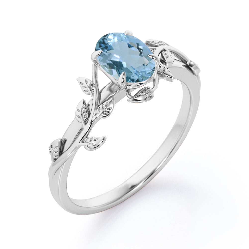 1 Carat Oval Cut Aquamarine Leaf And Vine Engagement Ring In White Gold