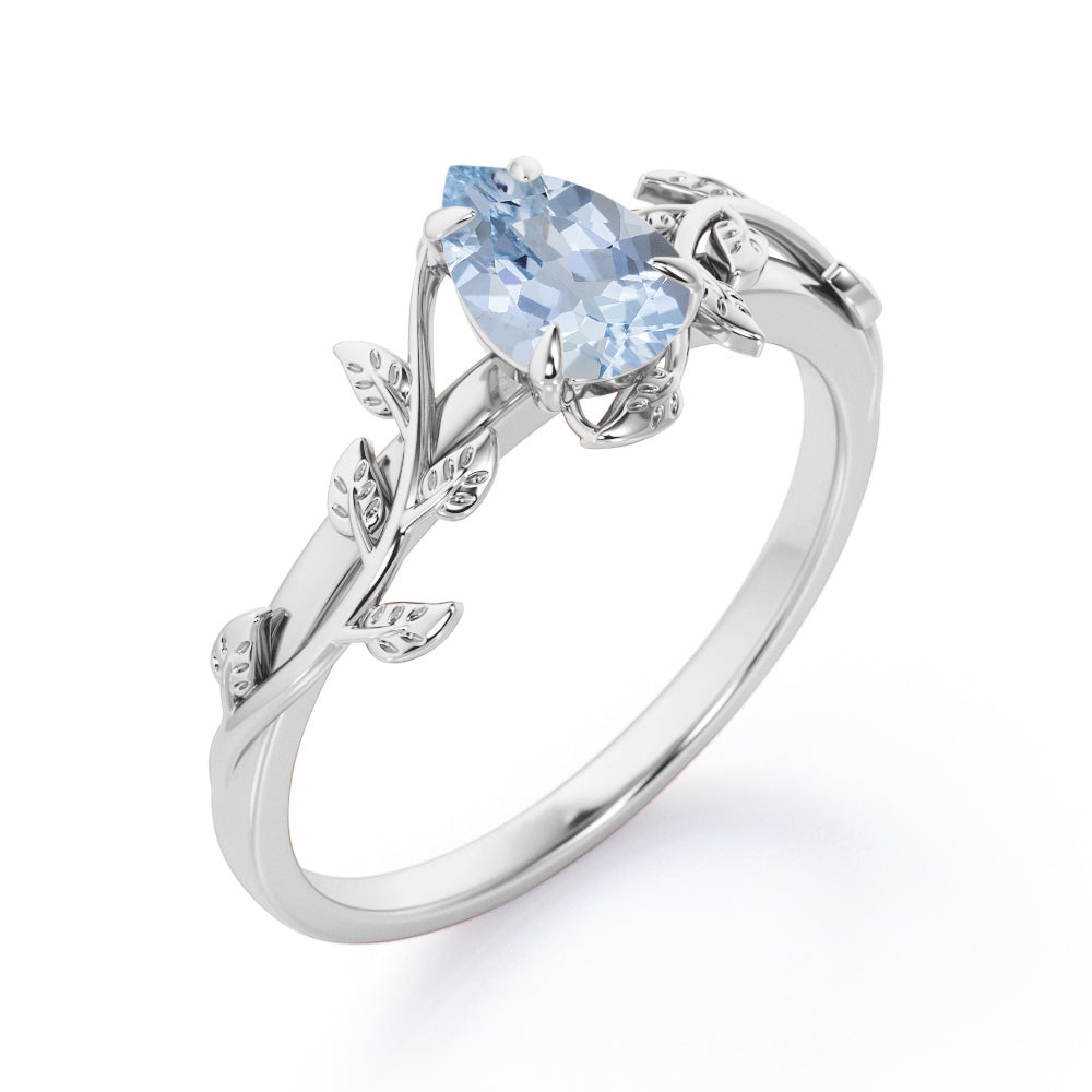 1 Carat Pear Cut Aquamarine Flower Inspired Engagement Ring In White Gold