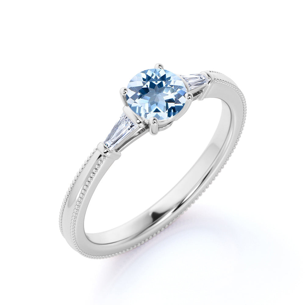 1.10 carat Round Sky Blue Created Aquamarine 3 Stone Simple Engagement Ring in 18k Yellow Gold over Silver