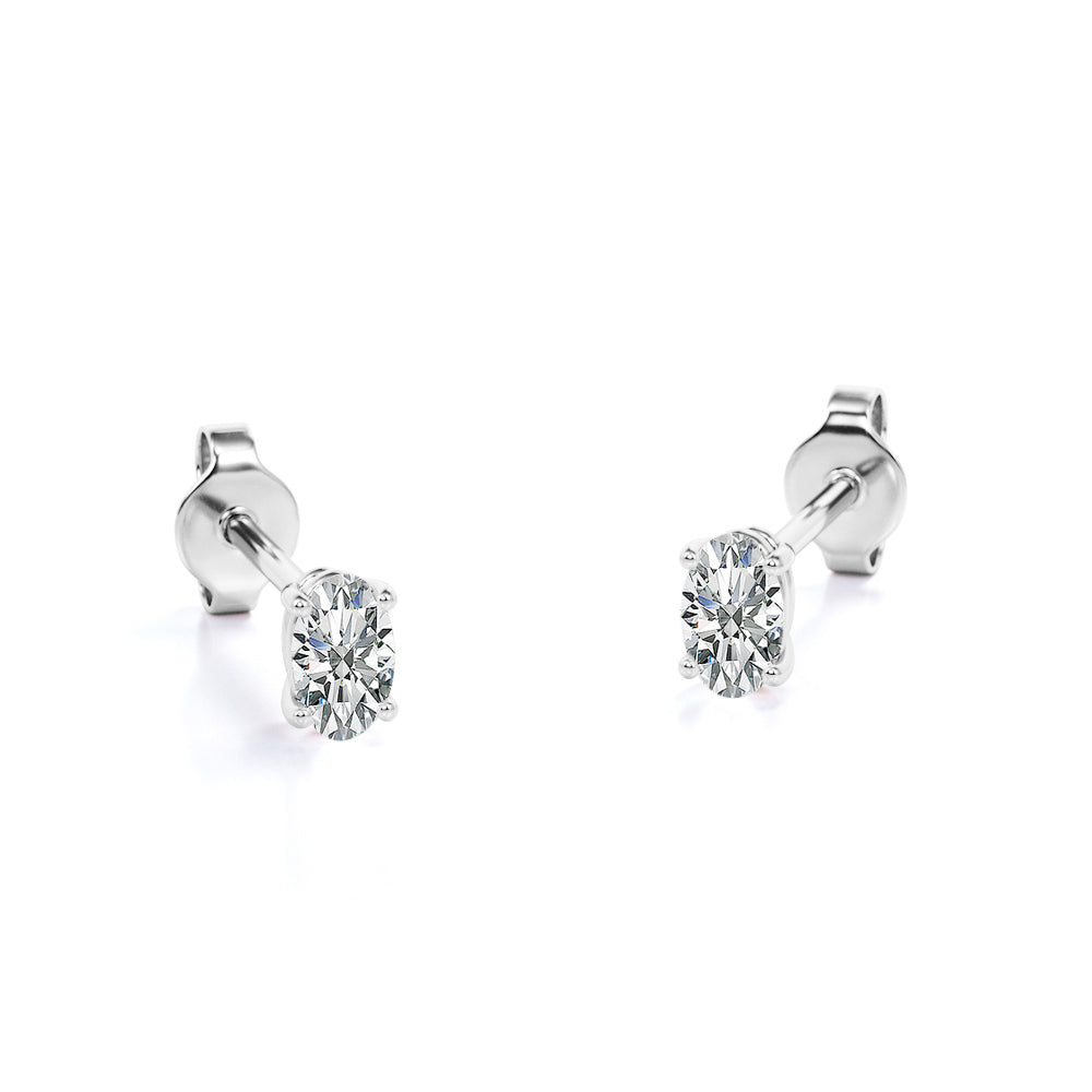 4 Prong 0.75 Carat Oval Cut Diamond Solitaire Stud Earrings In 18K Rose Gold Plating Over Silver