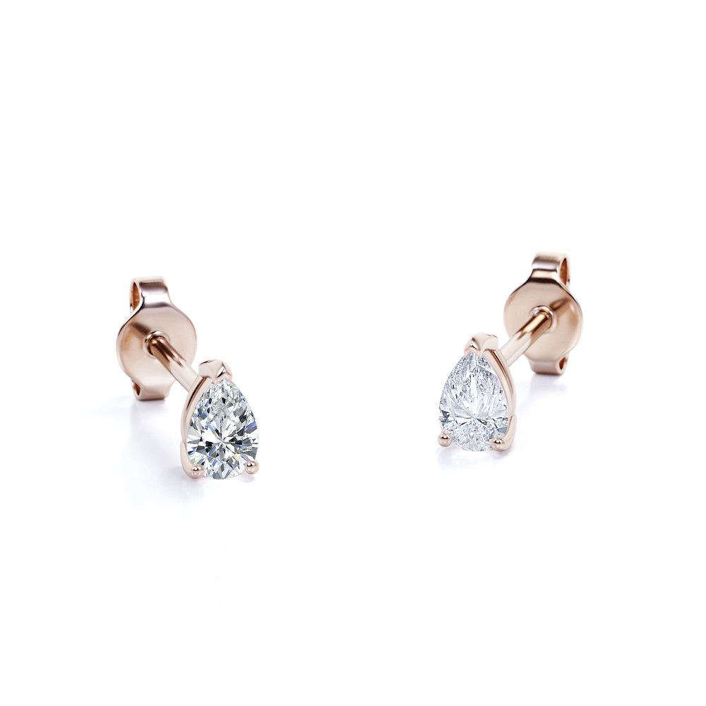 0.5 Carat Pear Cut Diamond Minimalist Solitaire Stud Earrings In 18K Rose Gold Plating Over Silver